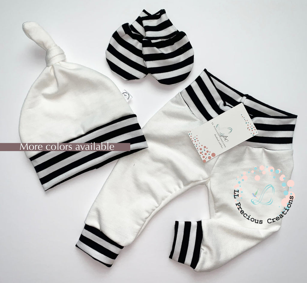 Gender Neutral Baby Leggings Headband Hat Outfit by LL Precious Creations #babyoutfit #whiteleggings #solidcolorleggings #babypants #newbornbabyoutfit #babygirloutfit #babyboyoutfit #babyboypants #babyleggings #blackstripespants #cominghomeoutfit #newbornbabygirl #babygift #babyshowergift #llpreciouscreations