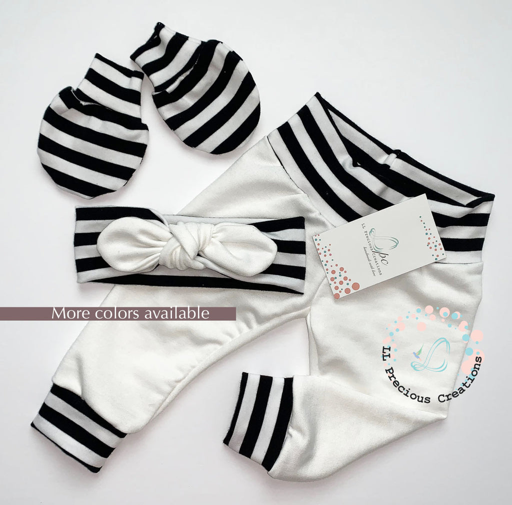 Gender Neutral Baby Leggings Headband Hat Outfit by LL Precious Creations #babyoutfit #whiteleggings #solidcolorleggings #babypants #newbornbabyoutfit #babygirloutfit #babyboyoutfit #babyboypants #babyleggings #blackstripespants #cominghomeoutfit #newbornbabygirl #babygift #babyshowergift #llpreciouscreations